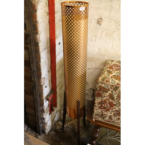 773 - Rocket style floor lamp with piered metal shade, 135cm.