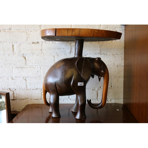 788 - African hardwood table with elephant base, 58cm.