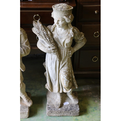 789 - Composite garden statuary of child holding wheat sheaf, 77cm.