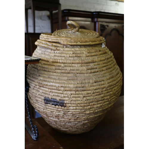 808 - Woven basket with lid and handles to side, 55cm.