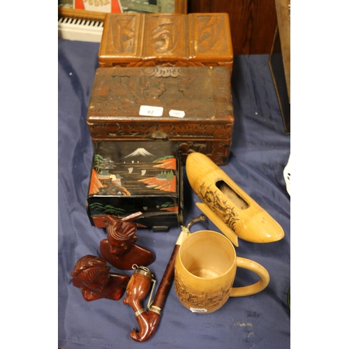 82 - Two carved boxes, busts, pipe, etc.