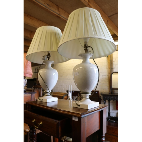 829 - Pair of crazing effect baluster shaped table lamps, 70cm to top of shades.