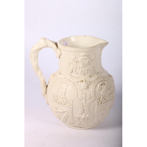 9 - William Brownfield and Sons relief moulded parian ware jug depicting the four nations and royal cres... 