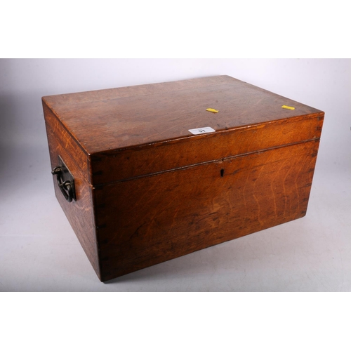 91 - Early 20th c. hinged oak box with drop handles to side, 22 x 43 x 31cm.