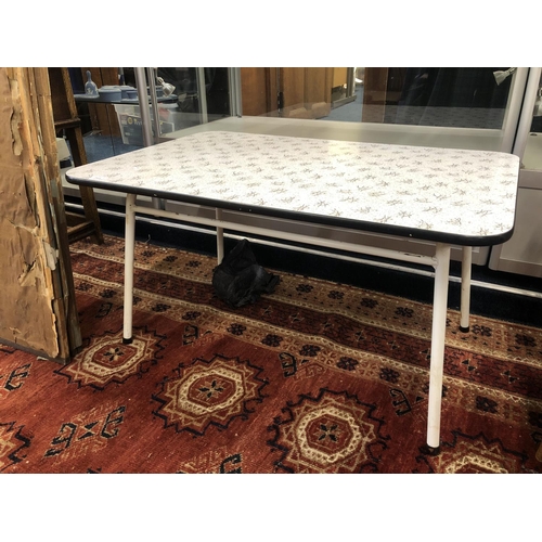 713 - Laminate topped metal framed table, 49 x 93 x 61cm.