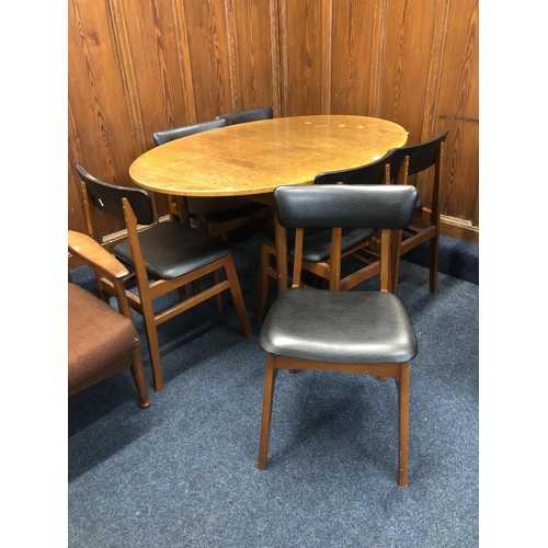 724 - Teak oval dining table with jack knife leaf and six chairs, 73 x 172 x 92cm when open.