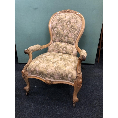 741 - Victorian walnut carved armchair, 96cm.