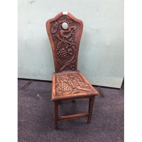 743 - Grape vine carved hall chair, 90cm.