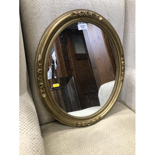 840 - Oval wall mirror with gilt frame, 50 x 42cm.