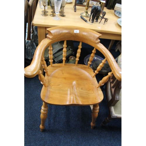 861 - Teak captains chair.