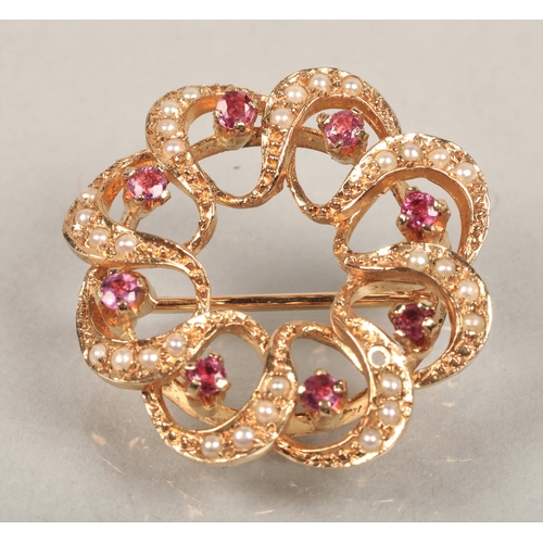 65 - 9ct gold brooch set with Rubies & seed pearls, total weight 5.2g