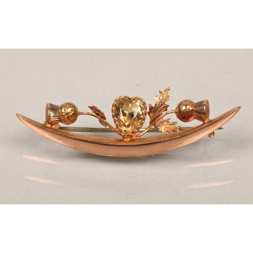 69 - 9ct rose gold thistle broach with Citrine stone.2.2 grams