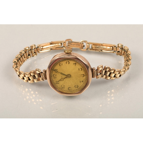 100 - Ladies 9 ct gold Rolco wrist watch on a rolled gold strap