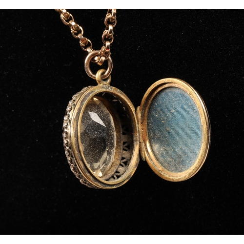 86 - Yellow metal locket with citrine stone and 9ct gold chain. chain weight 6 grams