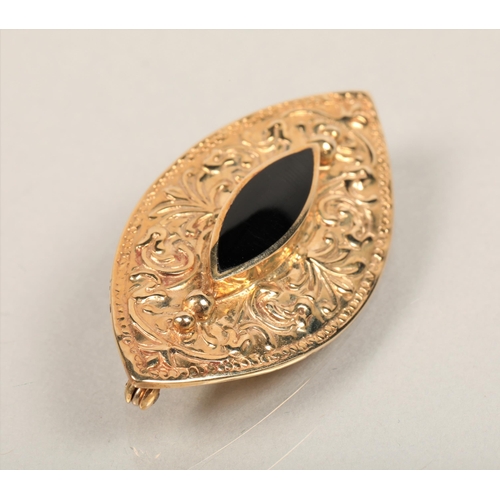 89 - 9ct gold and black onyx brooch