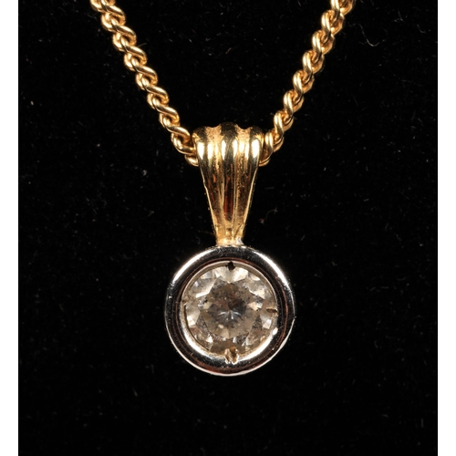 91 - 18ct solitaire diamond gold pendant , approximately 0.5 carat with 18ct gold chain.