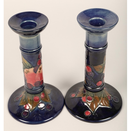 12 - Pair of modern Moorcroft candlesticks, 22 cm (2)