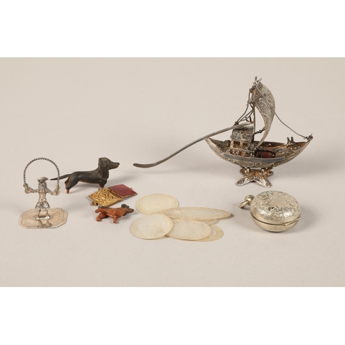 167 - Quantity of items including sovereign holder, white metal filigree model ship, Japanese mother o'pea... 