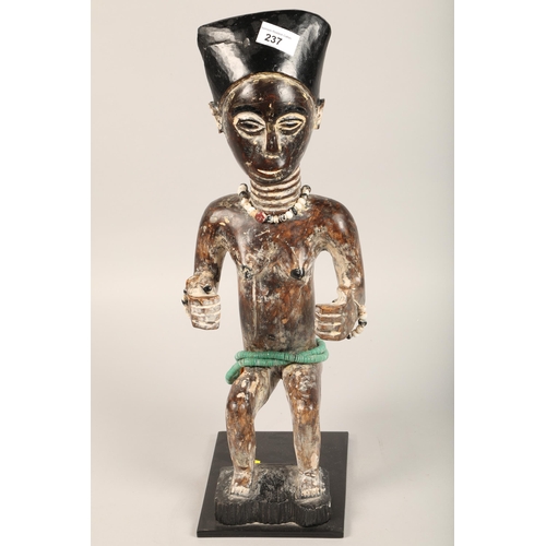 237 - African hardwood figure of a woman with beads, 54 cm high, with another 21 cm high (2)