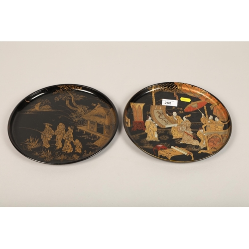 262 - Two lacquered plates 25.5cm in dimeter