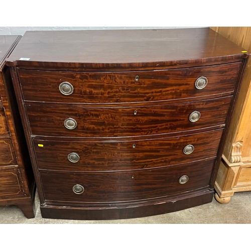 554 - Mahogany bow front chest of four graduated drawers