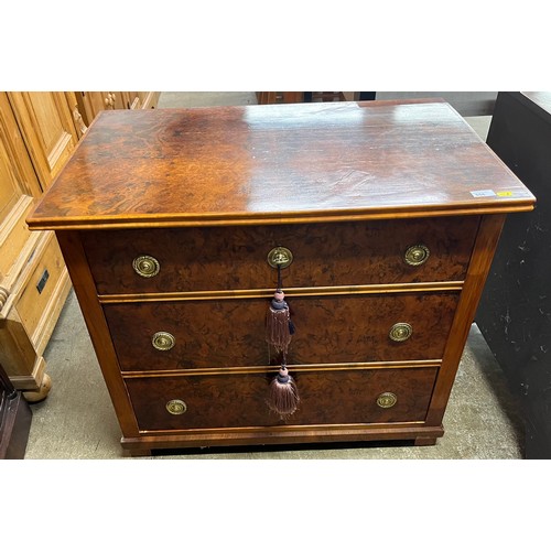 556 - Walnut chest of three drawers