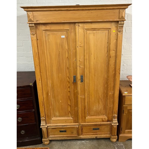 558 - Pine double wardrobe with two fitted drawers