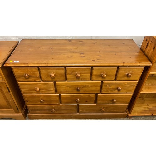 563 - Pine multi drawer chest