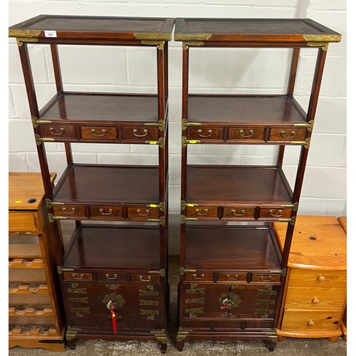 568 - Pair of oriental open units with fitted drawers 