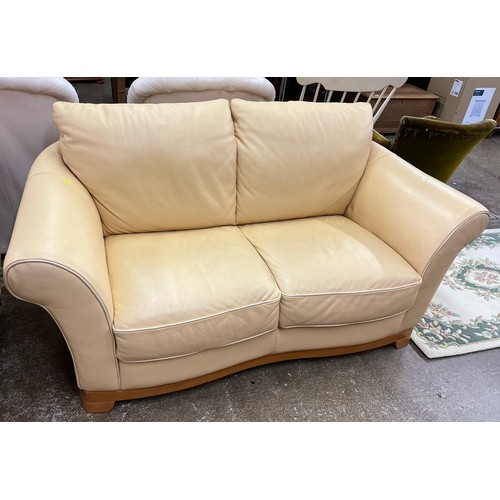 573 - Pair of yellow two seater settee's