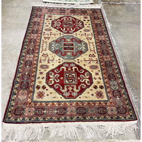 578 - Patterned rug227cm x 123 cm