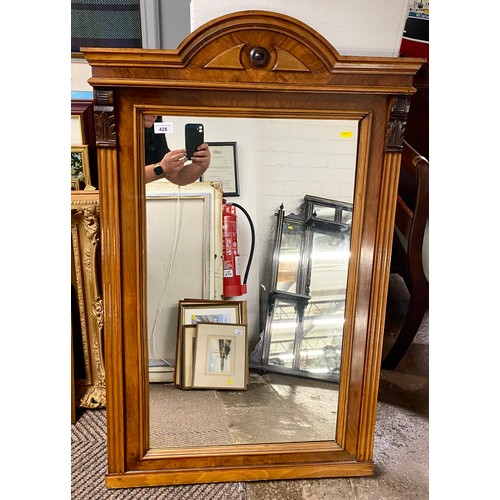 428 - Walnut framed hall mirror107cm x 67 cm 