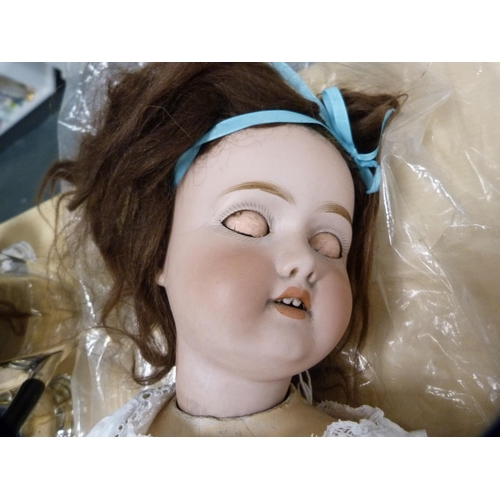 122 - 19th century Simon & Halbig German bisque-headed doll and a christening gown.