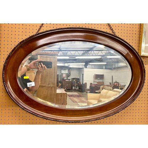 432 - Mahogany framed oval mirrror55cm x 82 cm