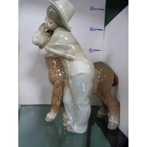 Lot 383 - Lladro - Three porcelain figures