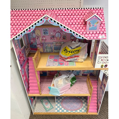 495 - Large dolls house and accessories, 120cm x 84cm