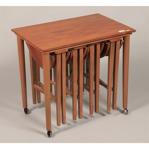 455 - Teak nest of four folding tables