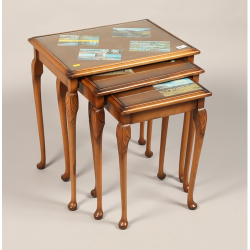 457 - Nest of three tables with glass preserves