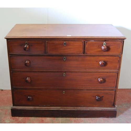 310 - George III mahogany chest of three short and three long graduated drawers with turned handles, on pl... 