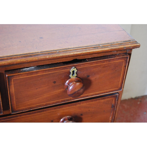 310 - George III mahogany chest of three short and three long graduated drawers with turned handles, on pl... 