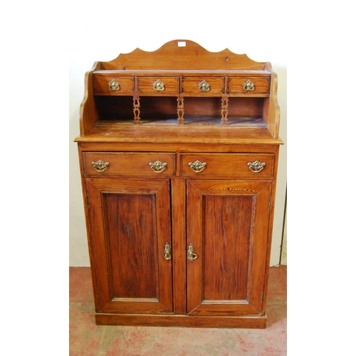 311 - Victorian Scotch pine dresser, the superstructure top with four short drawers above an open recess, ... 