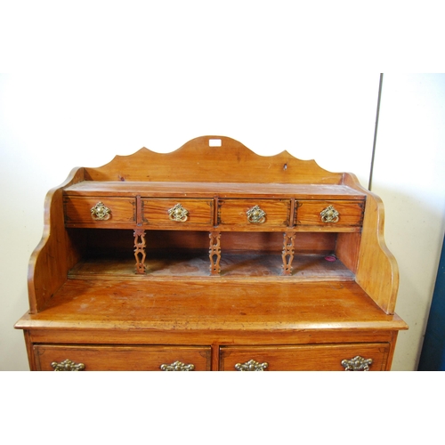 311 - Victorian Scotch pine dresser, the superstructure top with four short drawers above an open recess, ... 