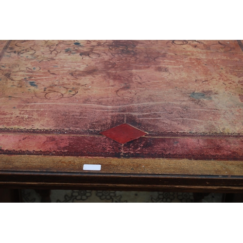 318 - Carved oak partner's desk, c. early 20th century, with tooled skiver above drawers and doors to both... 