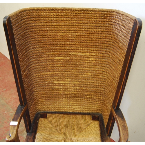 321 - Orkney chair with shaped woven canopy back, detachable woven seat, scroll arm rests, on tapered supp... 