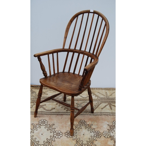 325 - 19th century ash and elm Windsor armchair with hoop framed stick back, on spindle supports united by... 