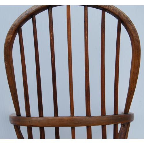 325 - 19th century ash and elm Windsor armchair with hoop framed stick back, on spindle supports united by... 