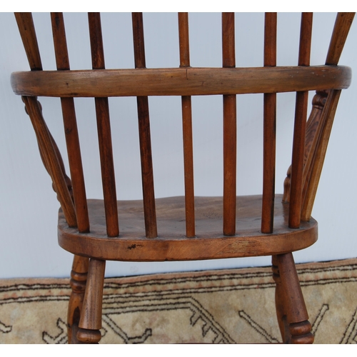 325 - 19th century ash and elm Windsor armchair with hoop framed stick back, on spindle supports united by... 