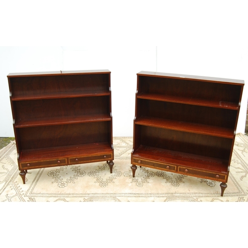 330 - Pair of Regency design mahogany waterfall bookcases, each with open tiers above a pair of short draw... 