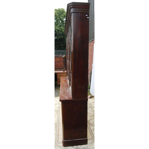 333 - Late Victorian / Edwardian inlaid mahogany library bookcase, the shaped dentil cornice above three a... 