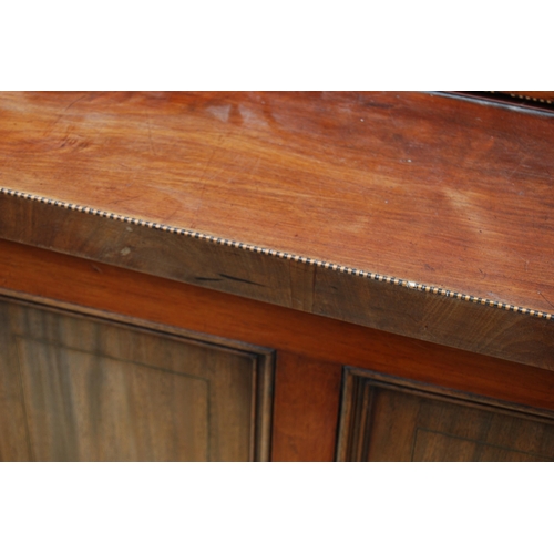 333 - Late Victorian / Edwardian inlaid mahogany library bookcase, the shaped dentil cornice above three a... 